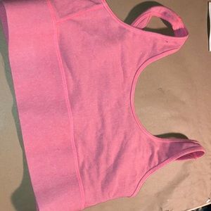 ADIDAS. Sports bra with cute gray backing. Peach colored. Good condition.